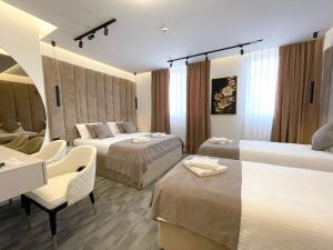 Letto o letti in una camera di Hotel NPL CODE