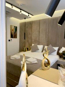 Letto o letti in una camera di Hotel NPL CODE