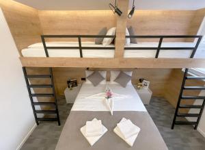 Letto o letti in una camera di Hotel NPL CODE