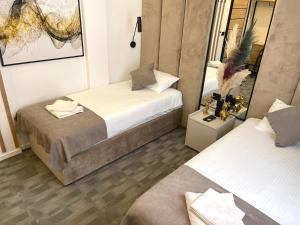 Letto o letti in una camera di Hotel NPL CODE
