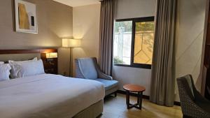 Llit o llits en una habitació de Imperial Plaza Hotel & Resort Juba