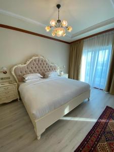 Postel nebo postele na pokoji v ubytování Riviera Hotel