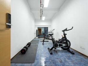 a gym with two exercise bikes in a room at Lavande Hotel Guangzhou Shatai South Road Tianpingjia Metro Station in Guangzhou