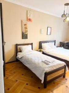 Postel nebo postele na pokoji v ubytování Hotel Vila + 37 fotografií