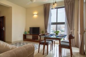 TV a/nebo společenská místnost v ubytování Marine Suites