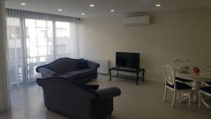 Ruang duduk di 6 Central Location, Close To Beaches And Anywhere