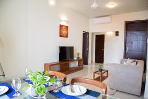 TV a/nebo společenská místnost v ubytování Marine Suites
