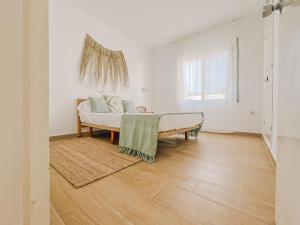 Posteľ alebo postele v izbe v ubytovaní Apartamentos Sol Naixent