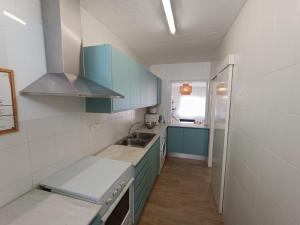 Kuchyňa alebo kuchynka v ubytovaní Apartamentos Sol Naixent
