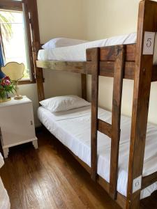 Łóżko lub łóżka piętrowe w pokoju w obiekcie Casa mia