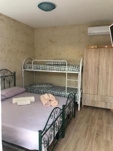 Postel nebo postele na pokoji v ubytování Salento Villa Don Peppino