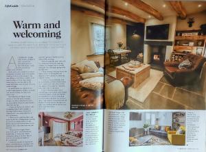 a article in a magazine about a living room at Sledbank Cottage in the Hill, Silecroft in Silecroft