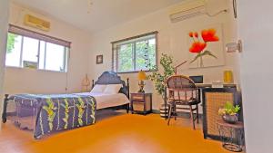 Postel nebo postele na pokoji v ubytování beach house Cg7p