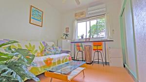 Postel nebo postele na pokoji v ubytování beach house Cg7p