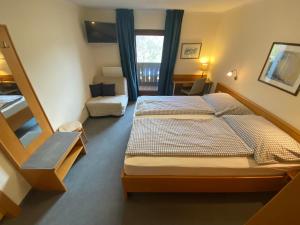 Tempat tidur dalam kamar di Pension Klimesch