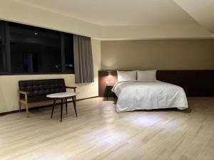 Ein Bett oder Betten in einem Zimmer der Unterkunft Just live inn - New Dahua