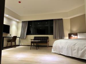 Ein Bett oder Betten in einem Zimmer der Unterkunft Just live inn - New Dahua