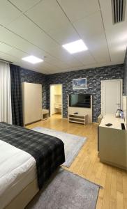 Postel nebo postele na pokoji v ubytování Badam d'Art Boutique Hotel
