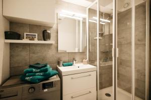 Koupelna v ubytování Cosy T1, à 10 minutes à pieds des plages