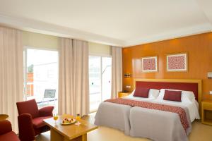 Uma cama ou camas num quarto em HSM Atlantic Park