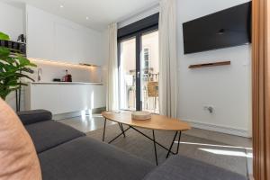 TV a/nebo společenská místnost v ubytování Apartamentos 7 dreams