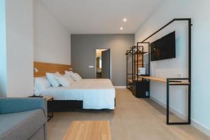 Кровать или кровати в номере HOTEL ALOVE