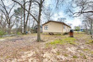 a small house in a yard with a tree at Charming El Dorado Retreat Near Main Street! in El Dorado