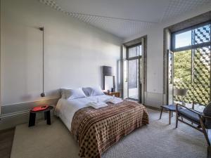 Ένα ή περισσότερα κρεβάτια σε δωμάτιο στο Malmerendas Boutique Lodging