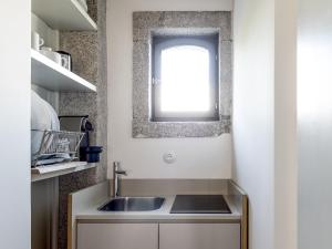 Η κουζίνα ή μικρή κουζίνα στο Malmerendas Boutique Lodging +90 φωτογραφίες