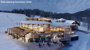 a rendering of a building in the snow at Hotel Cendevaves in Santa Cristina Gherdëina
