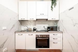 Cucina o angolo cottura di [Firenze] New and Elegant Suite