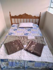 Łóżko lub łóżka w pokoju w obiekcie Hostel Trem das águas