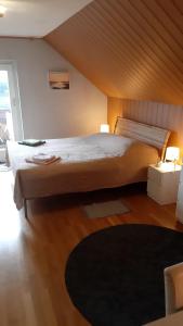 Katil atau katil-katil dalam bilik di Rooming Green mit Seeblick