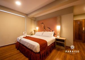 Cama o camas de una habitación en Hoteles Paraiso PIURA