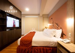 Cama o camas de una habitación en Hoteles Paraiso PIURA