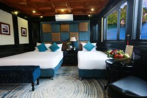 Giường trong phòng chung tại Star of the seas cruise