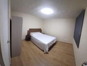 Postel nebo postele na pokoji v ubytování DEPARTAMENTO COMODO EN CHICLAYO