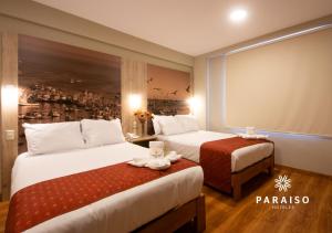 Cama o camas de una habitación en Hoteles Paraiso PIURA