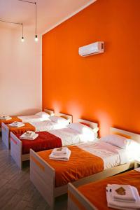 Cortile dei Giusti - Combo Guesthouse客房内的一张或多张床位