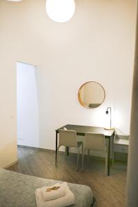 Cortile dei Giusti - Combo Guesthouse客房内的一张或多张床位