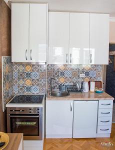 Η κουζίνα ή μικρή κουζίνα στο Apartment Mon Cheri