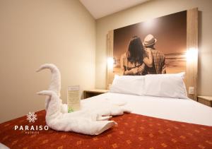 Cama o camas de una habitación en Hoteles Paraiso PIURA