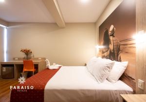 Cama o camas de una habitación en Hoteles Paraiso PIURA