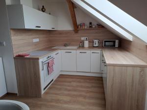 Kuchyňa alebo kuchynka v ubytovaní Loft Polná