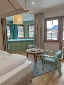 Postel nebo postele na pokoji v ubytování Hotel Kogler