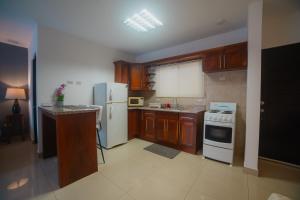 A cozinha ou cozinha compacta de Apto Studio Liberia
