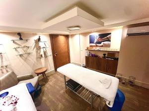 Voodi või voodid majutusasutuse King Suites Hotel toas