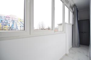 Φωτογραφία από το άλμπουμ του Stylish Apartment with video projector στο Βουκουρέστι