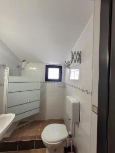 Koupelna v ubytování Casa Octaral