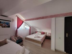 Postel nebo postele na pokoji v ubytování Casa Octaral